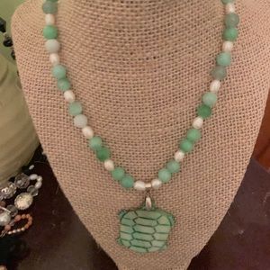 Lovely beaded necklace with turtle pendant